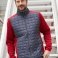 Chaqueta híbrida hombre Knitted Hybrid. .