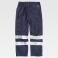Pantalón de trabajo multibolsillos unisex B1447. Color azul marino.