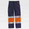 Pantalón alta visibilidad multibolsillos unisex C4018. Color azul marino/naranja a. V..