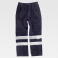 Pantalón alta visibilidad multibolsillos unisex S7016. Color azul marino.