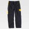 Pantalón de trabajo multibolsillos unisex WF1550. Color negro/amarillo.