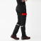 Pantalón de trabajo tejido elástico unisex WF2855. Color negro/rojo.