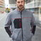 Chaqueta polar reciclada melange unisex JN1818. .