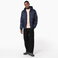 Chaqueta acolchada capucha reciclada unisex K6166. .