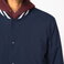Chaqueta beisbolera sostenible unisex NS618. .